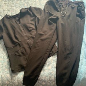 Jaanuu scrub set , zip up top with zip bottom joggers size medium